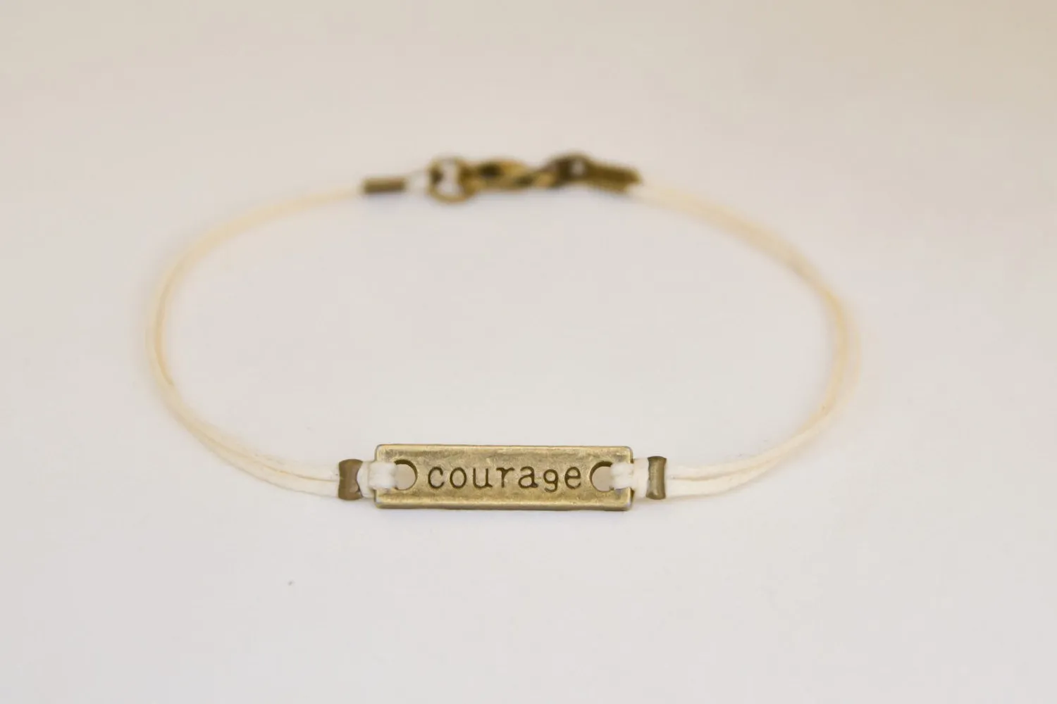 Courage bracelet for men, beige cord, motivation jewelry, bronze engraved charm